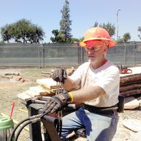 That's John, hard at work behind the TimberKing's controls