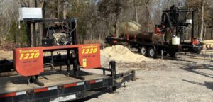 Chris recently sold his first TimberKing mill (left) and traded up to the big 2220. "I loved my small 1220, but the 2220 is a production mill," he says.