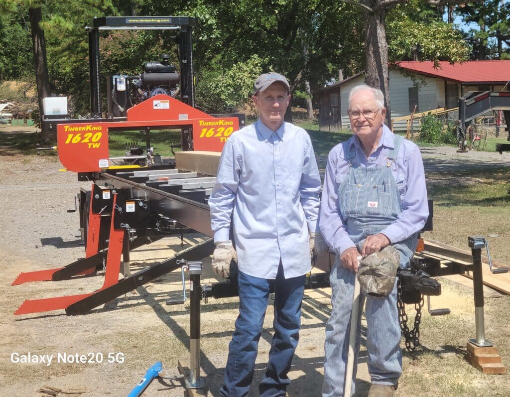 Daniel, his dad, and his brand new TimberKing