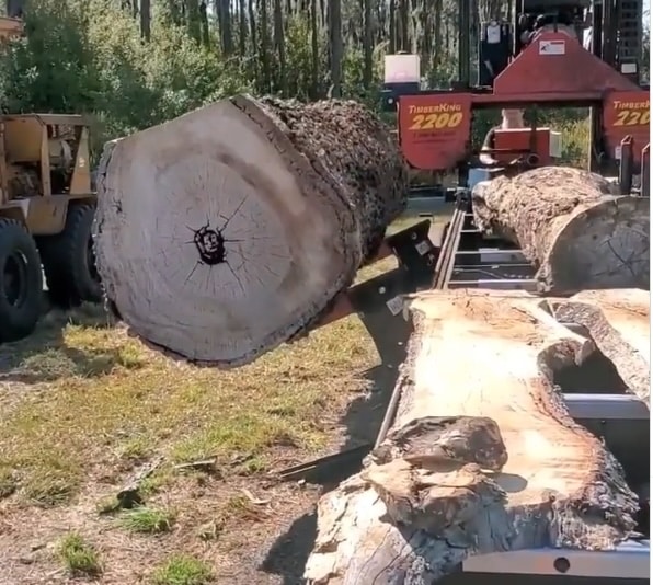 The full hydraulics on Floyd's new mill makes the whole sawing process and really boosts production