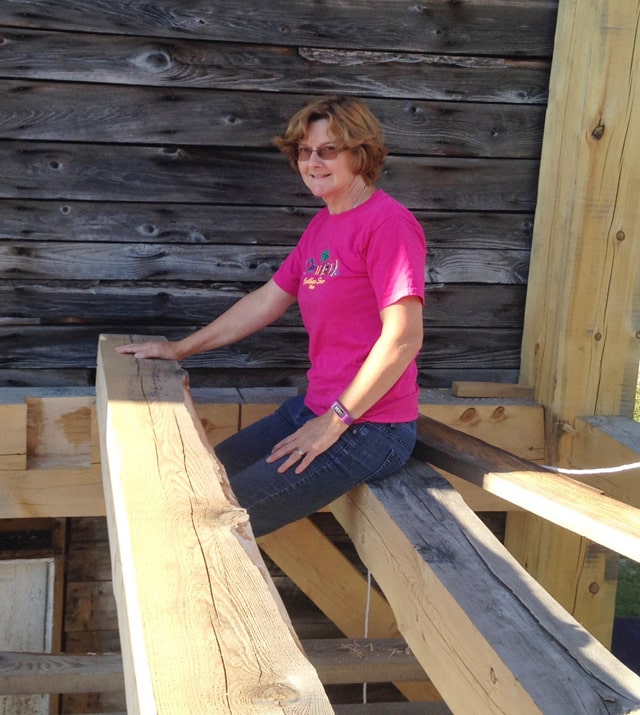 Rhonda's putting hemlock and pine ceiling beams in place in their 24' x 14' addition. Today, the downstairs is finished off while the upstairs is still a work in progress.