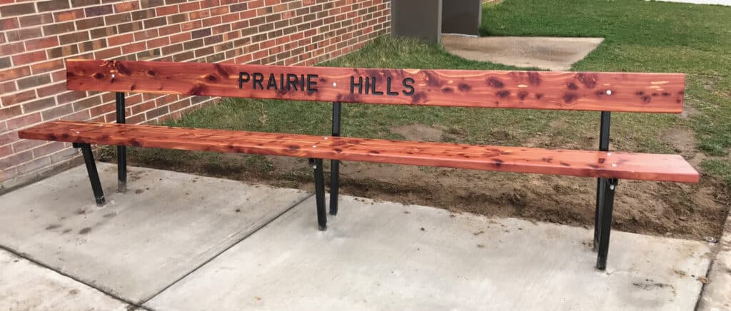 Ol' Doc and his son built this bench as his son's Eagle Scout project. It's installed at his son's old school — now the kids can chill out as they wait for the bus.