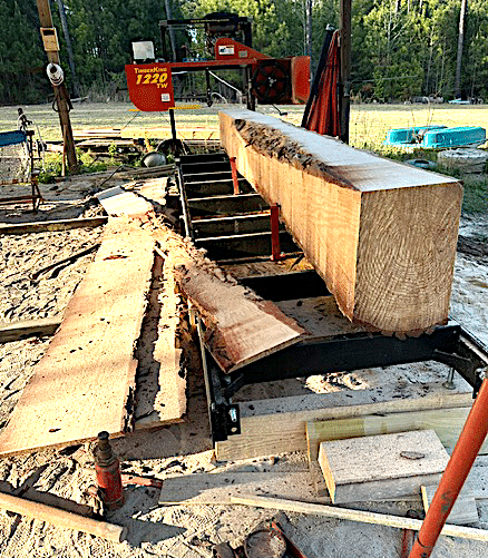 Sawn boards beside the TimberKing