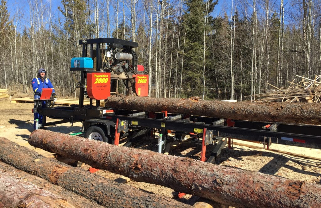 Plenty of timber in those Canadian woods. Daniel's living the good life sawing with his TimberKing 2000.