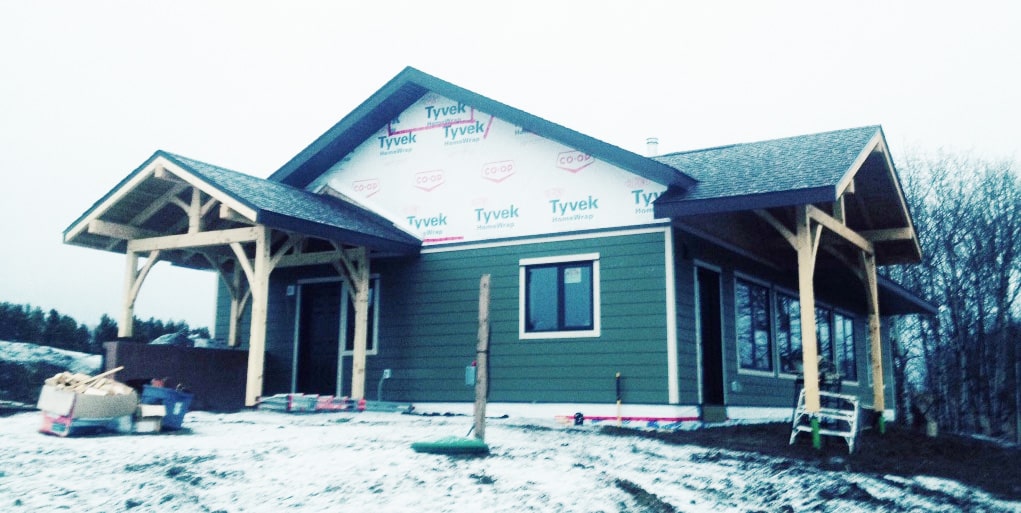 Timber frame porches make even a modest home far more handsome. Higher value, too.