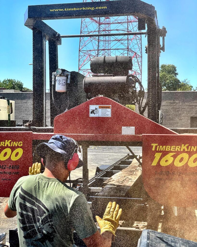 On the job with a TimberKing sawmill