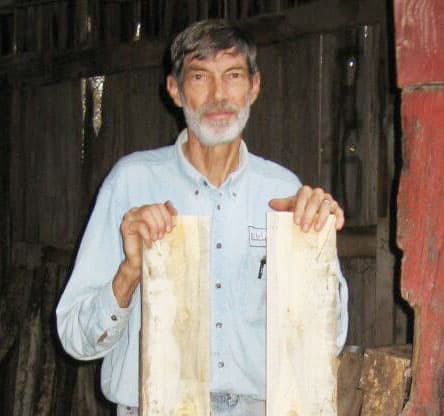 Here's Jim with two of the very first boards he sawed with his TimberKing mill — Silver Maple.