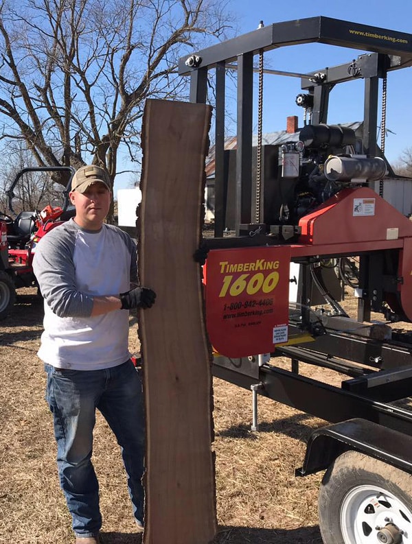 Cousin Nathan shows off some of their high quality sawn lumber