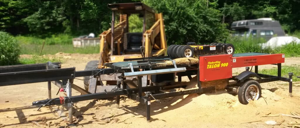 Here's Steve's TimberKing Talon Edger. He sets it up as a gang saw and can rip one wide board into four or five 2x4s. Cuts his production time at least in half.