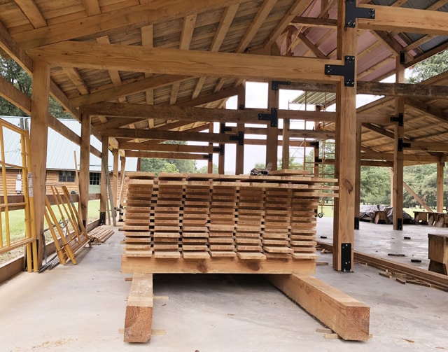 The whole Andries family gathered to build a large barn-style building so their big, extended family can spend time there together. Their 220 acres was a farm passed down by Bryan's grandparents; now it's a vacation retreat for the whole family.