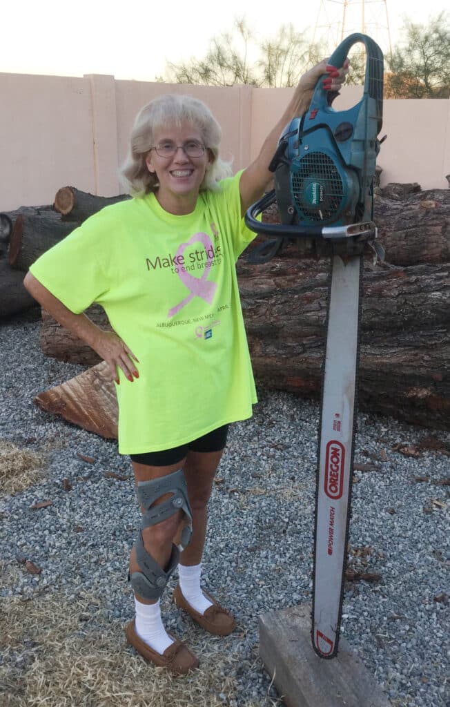 Mesquite grows BIG! Terri Langford holds Chequest Millworks' 48" chainsaw. 