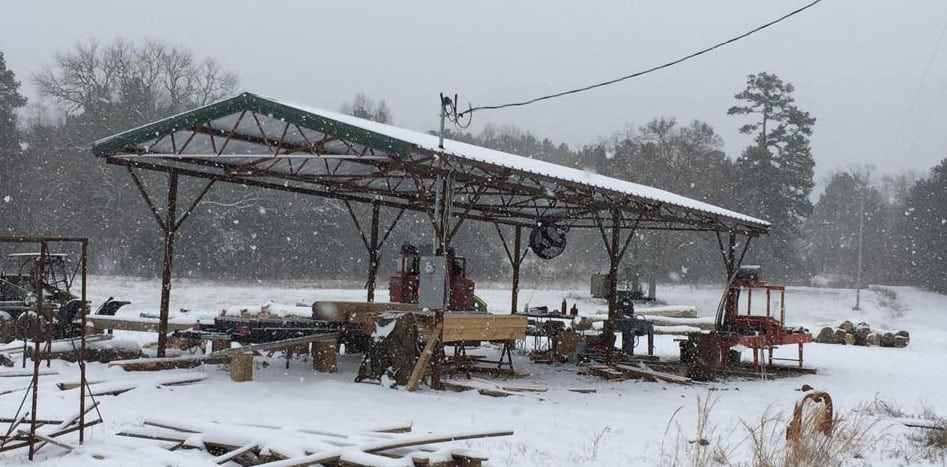 Think it never snows in Arkansas? Think again. Tom's shelter keeps the sun, rain, and snow off his TK mill.